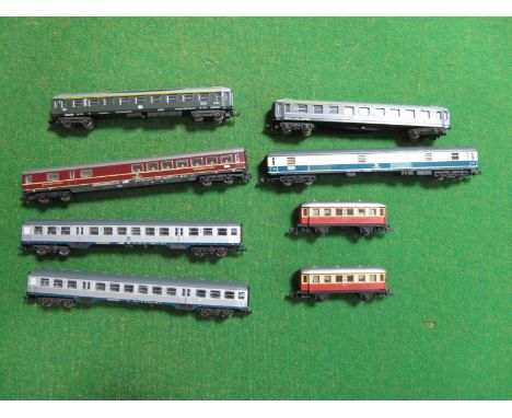 Eight "N"Gauge Coaches, unboxed, two four wheel gream/red by Arnold, two eight wheel LIMA DB Railways silver/green, three Fle