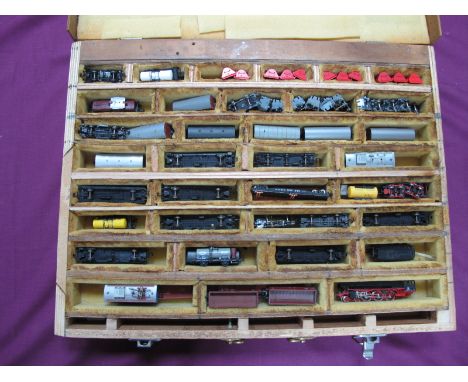 An "N"Gauge Purpose Built Wood Case, containing approximately thirty wagons, tankers, box vans, hoppers etc, three locomotive