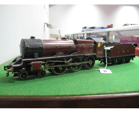 A Post War 4-6-0 'Royal Scot' Locomotive and Tender, by Bassett-Lowke, three rail electric, finished in LMS maroon, R/No. 610