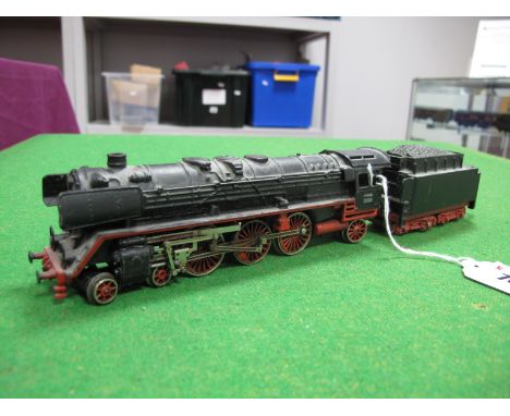 A Trix "HO" Gauge Pacific 4-6-2 Locomotive and Eight Wheeled Tender, R/No. D1001, black and red livery, signs of repainting, 