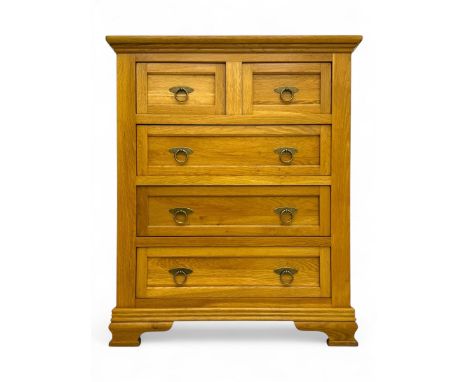Frank Hudson - contemporary light oak chest, rectangular moulded top over two short and three long drawers, brass oval backpl