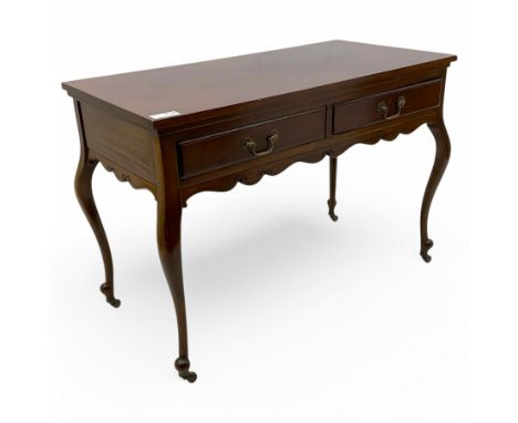 Late Victorian mahogany side table, rectangular top over two drawers and shaped apron, on cabriole supports with brass and ce
