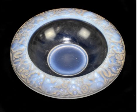 PIERRE D'AVESN; an iridescent moulded glass bowl with rim decorated with birds amongst grapes and vines, moulded mark to base