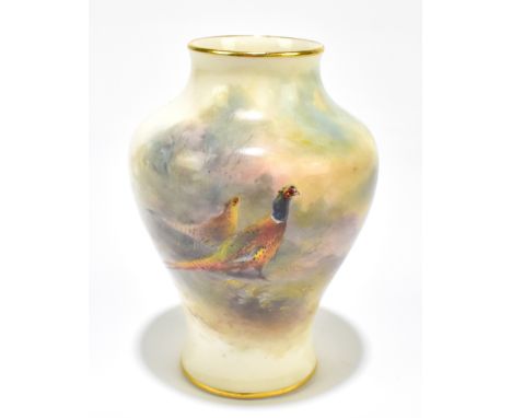 JAMES STINTON FOR ROYAL WORCESTER; a hand painted vase of shouldered form painted with pheasants in landscape setting, signed