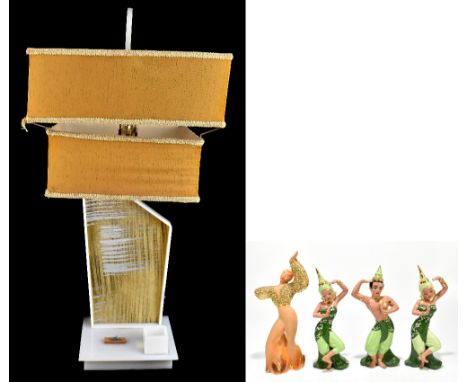 MOSS LAMP; an American plexiglass table lamp with four associated ceramic figures, two of which are mounted to the lamp, with