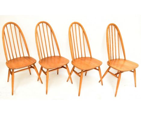 ERCOL; a set of four light elm hoop back dining chairs (4).Additional InformationOne seat has a split. One is of loose constr