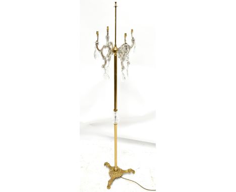 A gilt brass standard lamp with glass drops, height excluding shade 166cm.