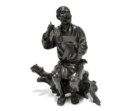 A Japanese bronze okimono depicting an elder seated on tree stump while eating, bears signature to the underside, height 18cm