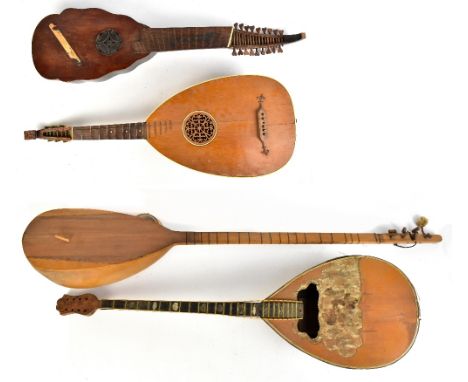 A German lute, 94cm, a Greek tlaouti, 96cm, a Turkish baglama saz, 130cm, and a reproduction Renaissance sittern, 99cm, all f