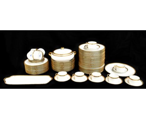 RAYNAUD &amp; CO; a Limoges gilt heightened white porcelain part dinner service comprising twenty-four 9.5” plates, twelves 8