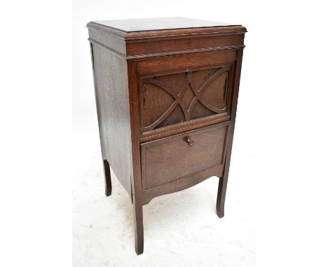 HMV; an oak cased Model 145 gramophone, height 87cm, width 45cm, depth 42.5cm.Provenance: The Norman Roland Collection of Mec
