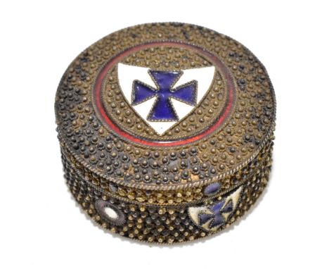 A Continental silver and enamel pillbox of circular form, the cover with shield shaped cross, indistinct marks to rim, diamet