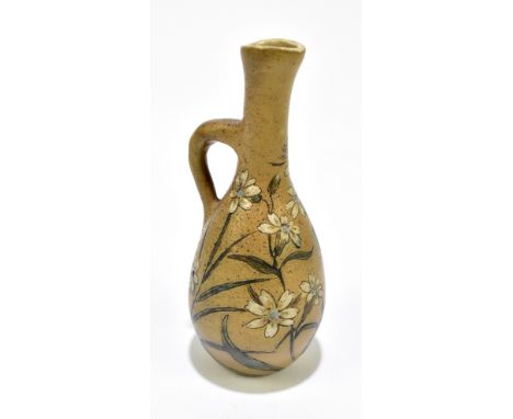 MARTIN BROTHERS; an art pottery jug of bulbous form with elongated neck, with floral detail, signed Martin Brothers London to