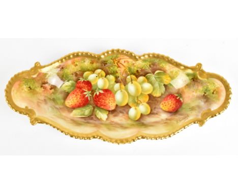 E TOWNSEND FOR ROYAL WORCESTER; a hand painted dish of oval form painted with fruit, signed to rim, puce marks to base, lengt