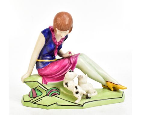ROYAL DUX; an Art Deco figure group of flapper with two kittens, decorated in polychrome enamels, pink triangle mark and stam