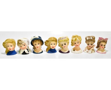 UCAGCO; eight assorted Japanese ceramic busts depicting maidens, height of largest example 15cm.Additional InformationCrazing
