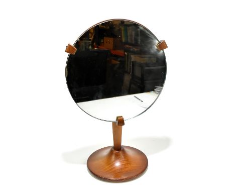 ERCOL; a medium elm framed dressing table mirror model no.438, raised on column supports, height 49cm.Additional InformationT