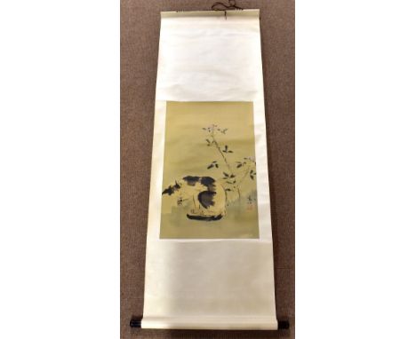 A 20th century Chinese scroll print depicting a cat beside a blossoming branch, with seal mark, approx 70 x 43cm, rolled.Addi