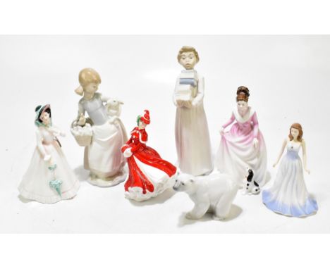 ROYAL DOULTION; four figures to include HN2706 'Julia', HN3608 'Good Companion', etc, together with a Lladro figure of a girl