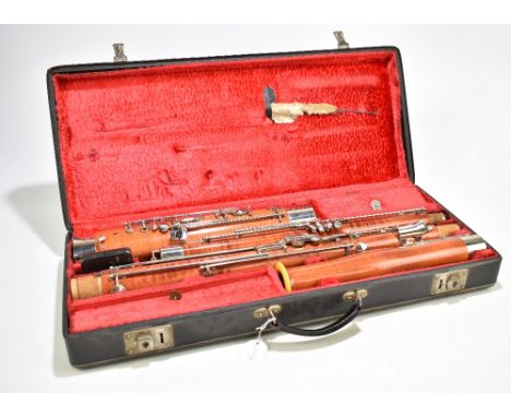 ARTLA FOR BOOSEY &amp; HAWKES, LONDON; a modern Czechoslovakian made bassoon, cased.