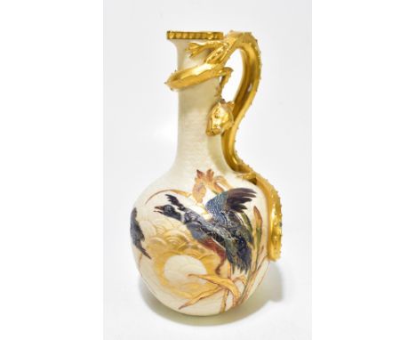 ROYAL WORCESTER; a blush ivory dragon handled ewer, painted with mallards in flight, factory marks to base, height 28cm.Addit