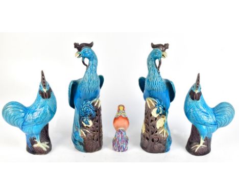 A pair of turquoise glazed Chinese phoenixes, height 41cm, a similarly glazed pair of roosters, height 31cm and a small model