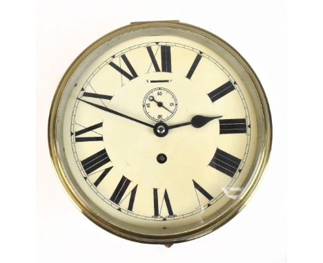 A brass cased ship’s clock, the circular dial with Roman numerals and subsidiary seconds dial, diameter 25cm.