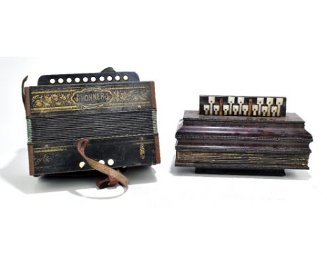 A late 19th century flutina and a Hohner button accordion, both for restoration (2).