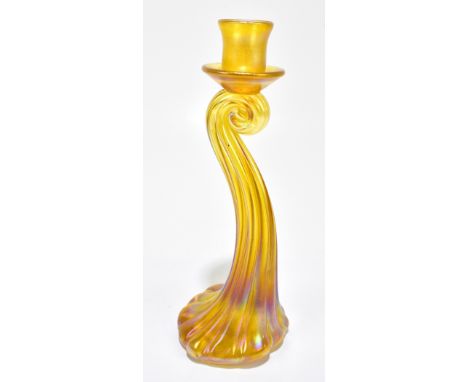 JOHN DITCHFIELD FOR GLASFORM; a contemporary iridescent glass candlestick, signed with original label to base, height 28.5cm.