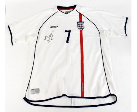 DAVID BECKHAM; an England Umbro 2001 home shirt, signed and further inscribed 'Love' with 7 printing to front, size XXL.Addit