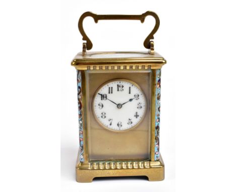 A 19th century brass cased carriage clock with champlevé enamel corner columns flanking the central dial set with Arabic nume