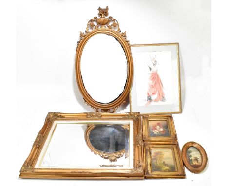 Two decorative gilt mirrors, the first oval with moulded foliate decoration, 76 x 40cm, the second rectangular with bevelled 