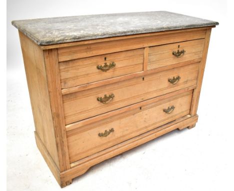 An old pine marble topped chest of two short over two long drawers, raised on bracket feet, length 107cm, depth 49cm, height 
