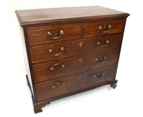 A Georgian mahogany chest of two short over three long drawers with brass swan neck handles, raised on bracket feet, length 8