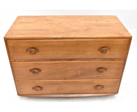 ERCOL; a light elm chest of three drawers model no.412, length 91cm, depth 43cm, height 66cm.Additional InformationMinimal we