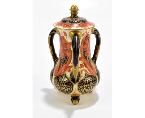 WILEMAN &amp; CO; a Foley faience ware three handled lidded vase, painted with floral sprays inside a gilt border, height 22c