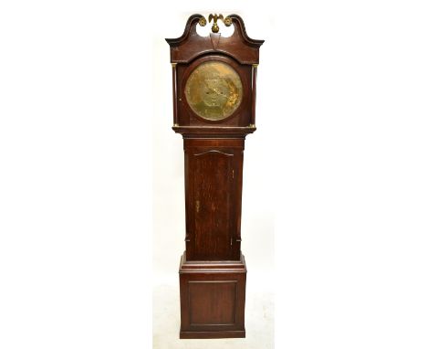 An 18th century oak cased longcase clock, the circular brass dial set with later inscribed Arabic numerals and subsidiary dia