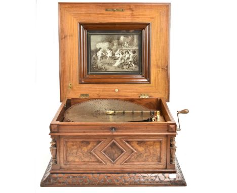 A Style 45 coin-free table top 15 1/2" disc Polyphon musical box in carved walnut and burr walnut case with floral marquetry 