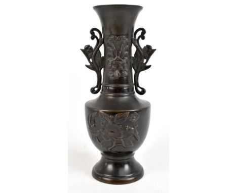 A Japanese bronze twin handled vase, relief decorated with stylised birds and floral decoration, height 30.5cm.Additional Inf