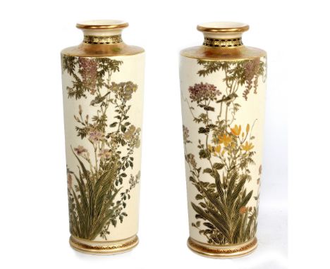 SENZAN; a pair of large Japanese Satsuma cylindrical vases decorated with birds amongst blossoming branches, both signed, hei