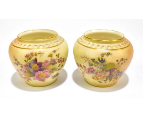 ROYAL WORCESTER; a near pair of vases, each with floral decoration, puce factory marks and numbered 2073 to base, height 8cm,