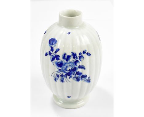 WORCESTER; an 18th century first period lobed tea caddy of baluster form, painted with floral sprays, height 13.5cm.Provenanc