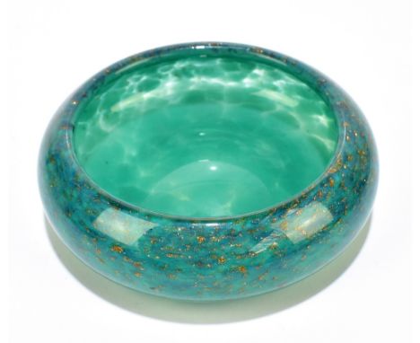 MONART; a small glass bowl with aventurine and green mottled colourway, embossed pontil mark to base, diameter 9.5cm.Addition