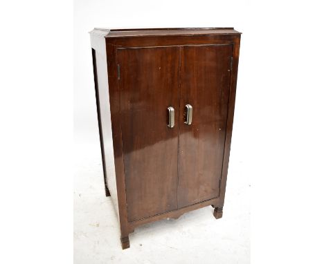 EAST-LIGHT; a mahogany 'Star' record cabinet, the twin doors enclosing eight divisions, on bracket feet, height 93cm, width 5