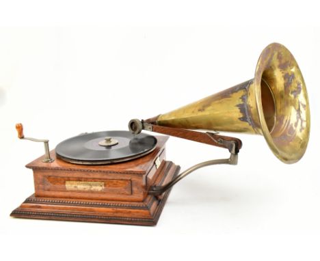 GRAMOPHONE & TYPEWRITER LTD; a New Style No.4 top wind horn gramophone, circa 1904, in panelled oak case with original applie