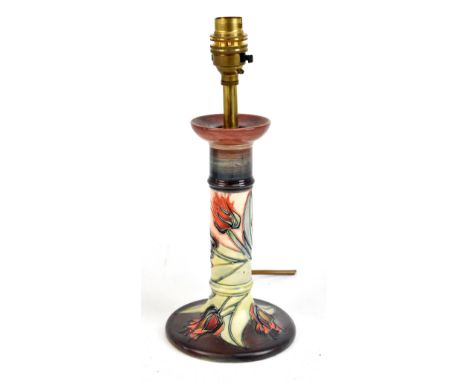 MOORCROFT; a candlestick table lamp decorated in 'Tulip' pattern, height 21cm.Additional InformationThe item would benefit fr