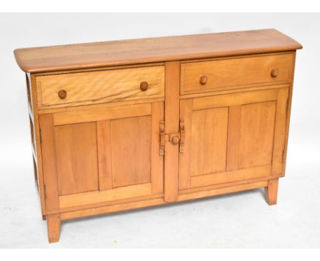 ERCOL; a 1950s dresser, the detachable plate rack with two fixed shelves, the base with two drawers above two cupboard doors,