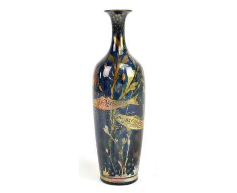 RICHARD JOYCE FOR ROYAL LANCASTRIAN; a lustre bottle shaped vase with flared neck decorated with fish on a blue ground, signe