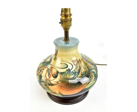 PHILLIP GIBSON FOR MOORCROFT; a table lamp decorated in the 'Trout' pattern, raised on wooden plinth base, height excluding f