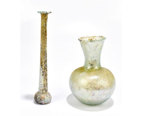 A Roman 'candlestick' unguentarium of tapered form with iridescence, length 19cm, and an iridescent spherical bodied flask wi